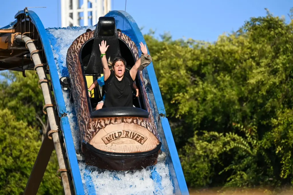Fairgoers enjoy the rides during the final weekend of the...