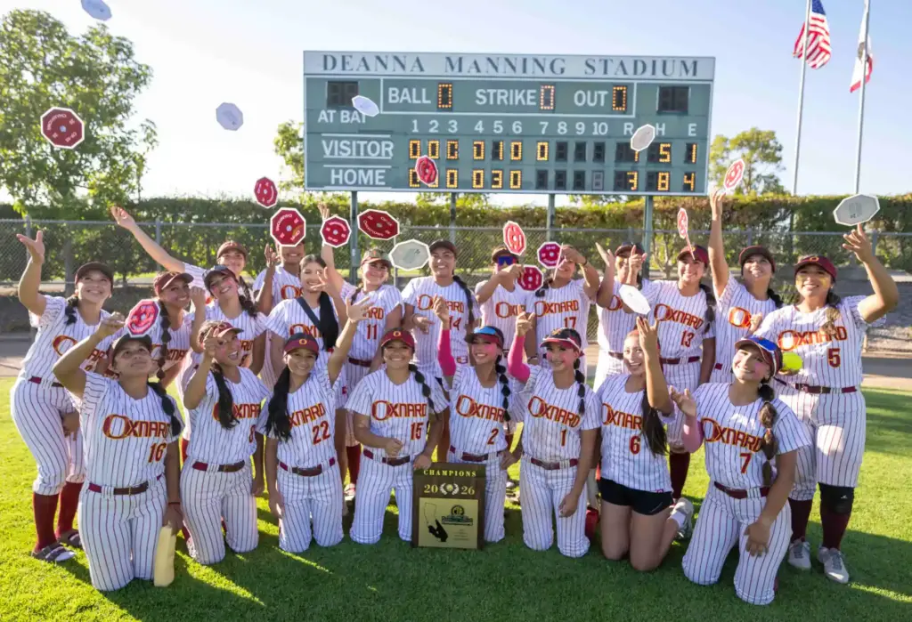 Oxnard players celebrate their 3-1 win over Mission Viejo by...