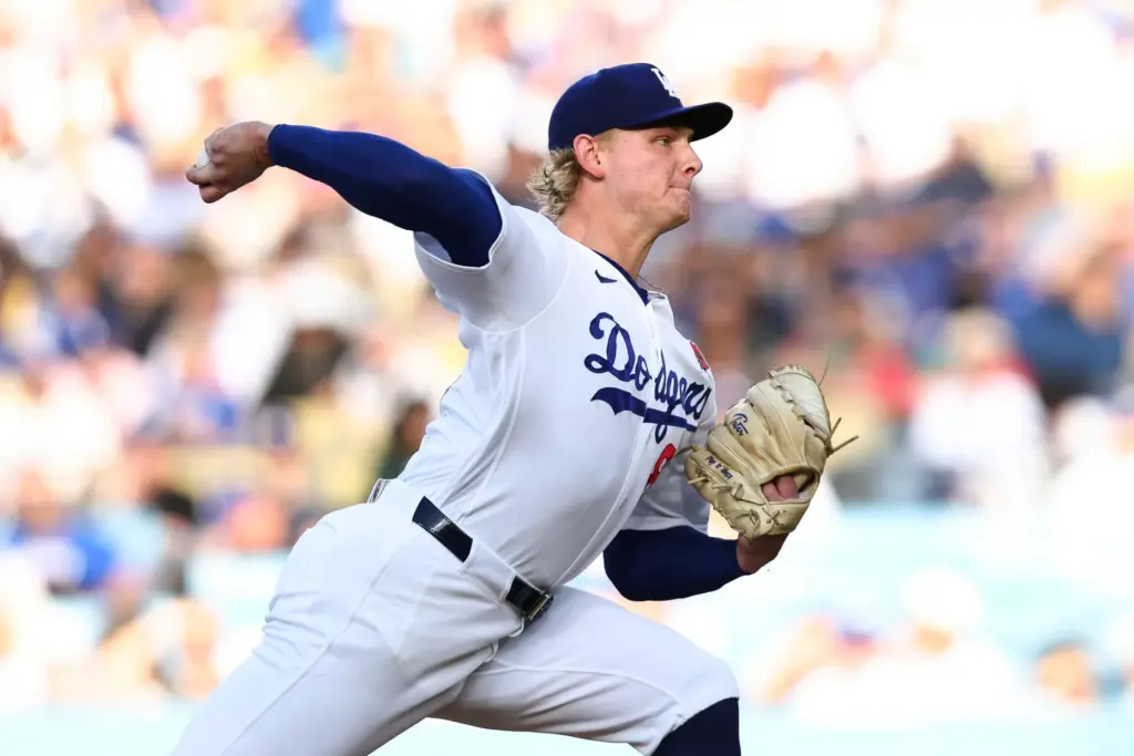 Dodgers pitcher Emmet Sheehan throws to a Colorado Rockies batter...