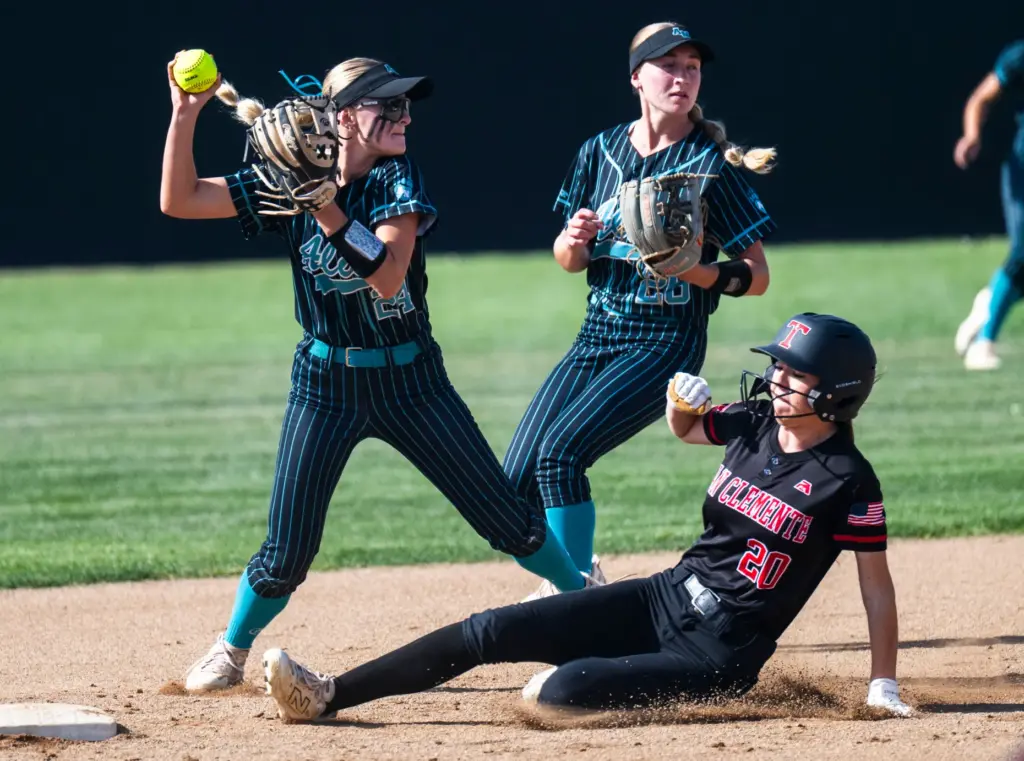 San Clemente’s Sydney Bishop is forced at second by Aliso...