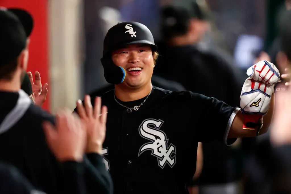 The Chicago White Sox’s Munetaka Murakami celebrates in the dugout...