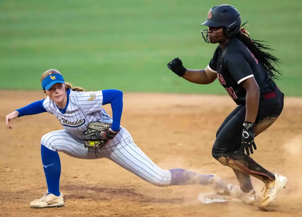 La Mirada shortstop Reese Hilliard tags out JSerra outfielder Zena...