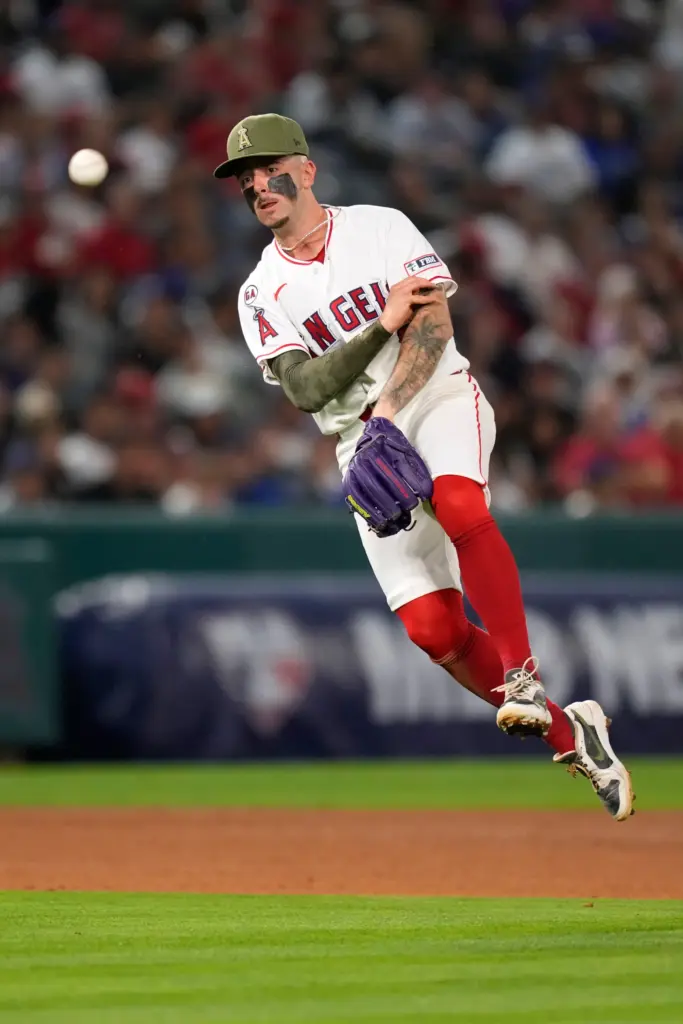 Angels shortstop Zach Neto throws out the Dodgers’ Andy Pages...