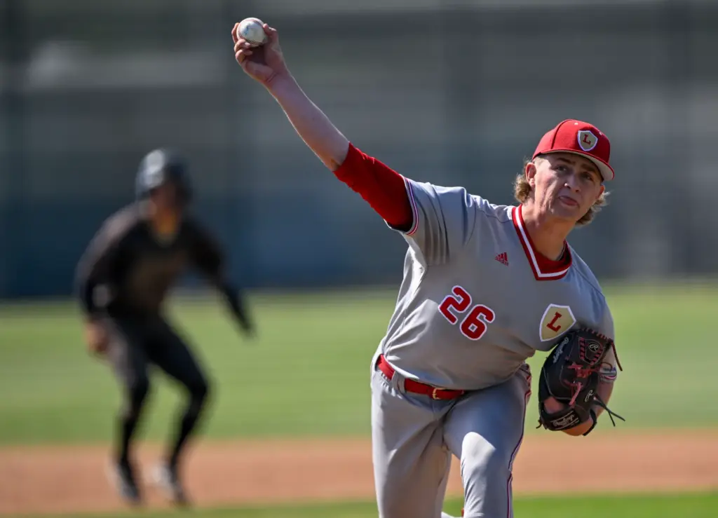 Orange Lutheran starting pitcher Sam Principe, who pitched the whole...