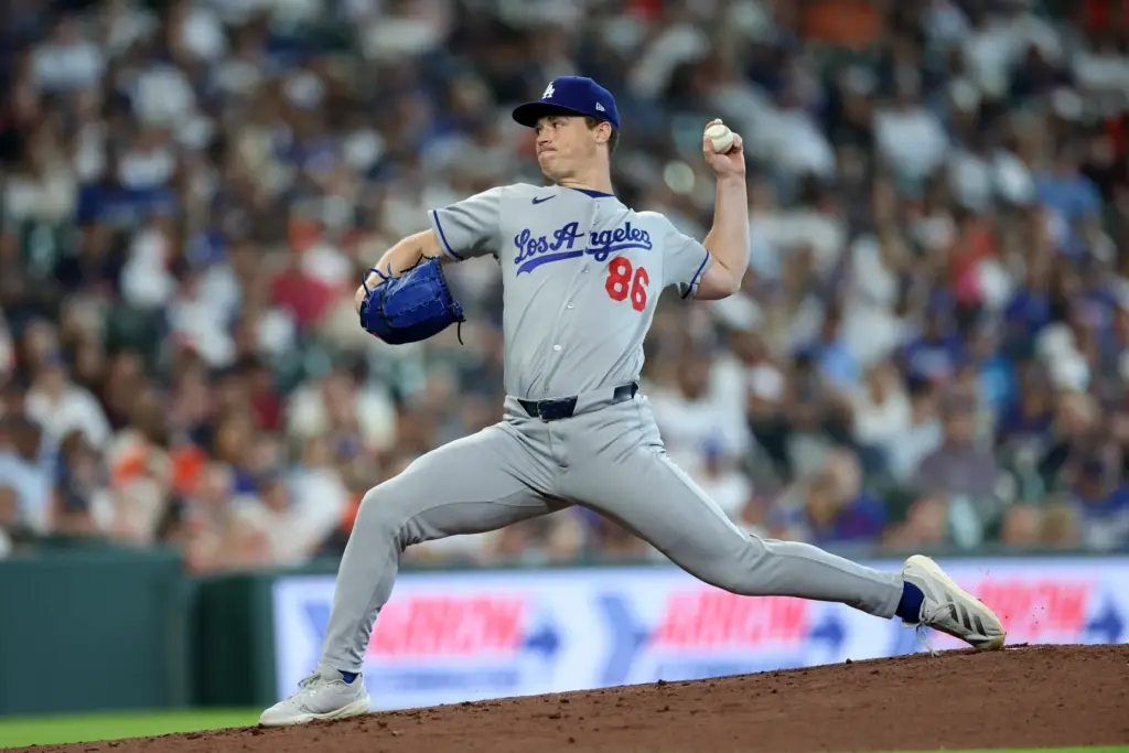 Dodgers relief pitcher Jack Dreyer throws to the plate during...