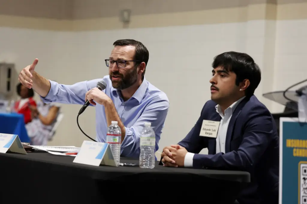 California Insurance Commissioner candidate Ben Allen, left, speaks alongside fellow...