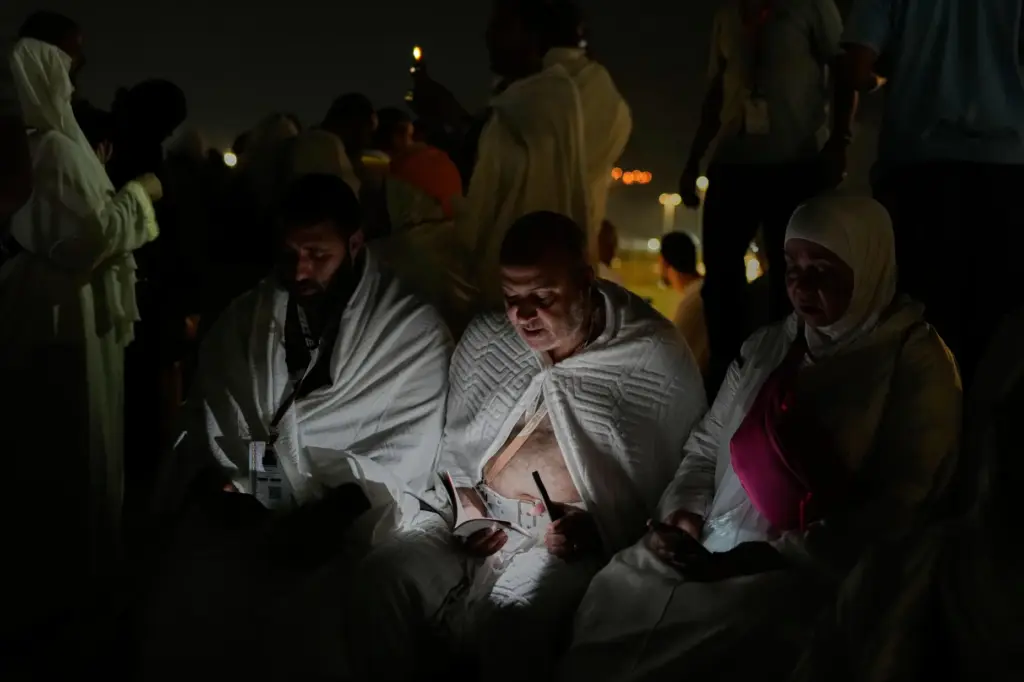 Muslim pilgrims read