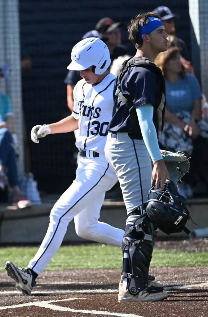 Grant Horsley (30) scores against Trabuco Hills in the 3rd...