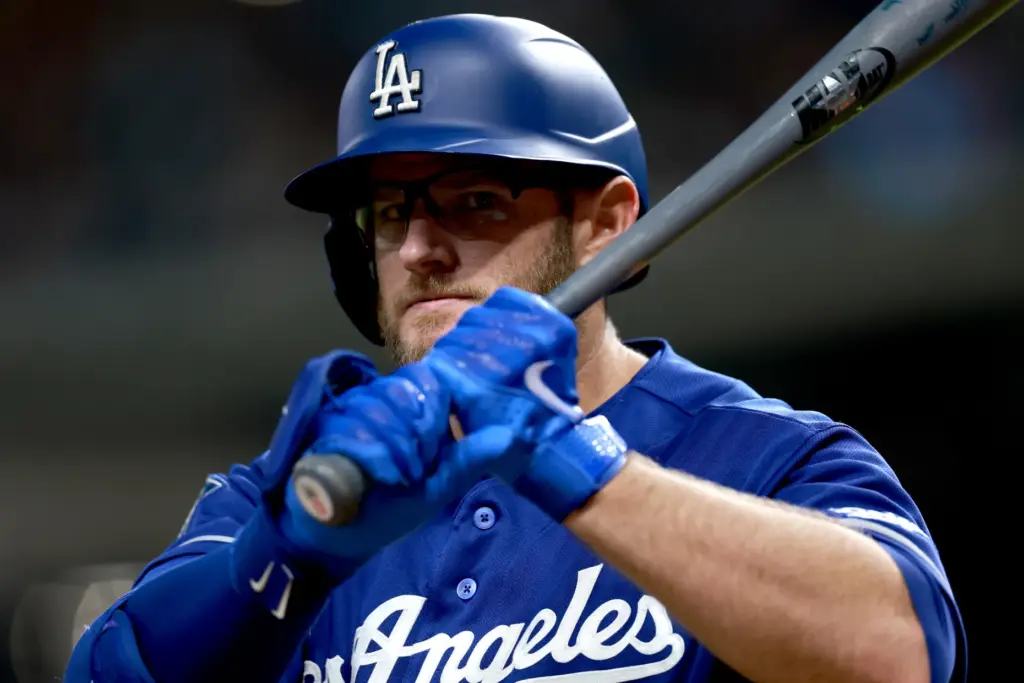 The Dodgers’ Max Muncy looks on while batting during the...