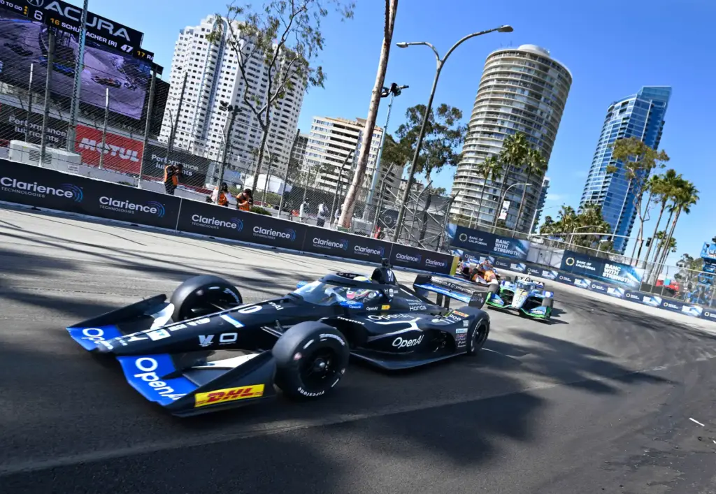 Indycar driver Alex Palou leads Felix Rosenqvisst out of the...