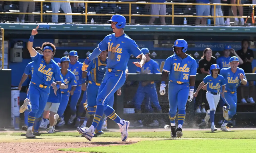 Will Gasparino #9 of the UCLA Bruins scores the winning...