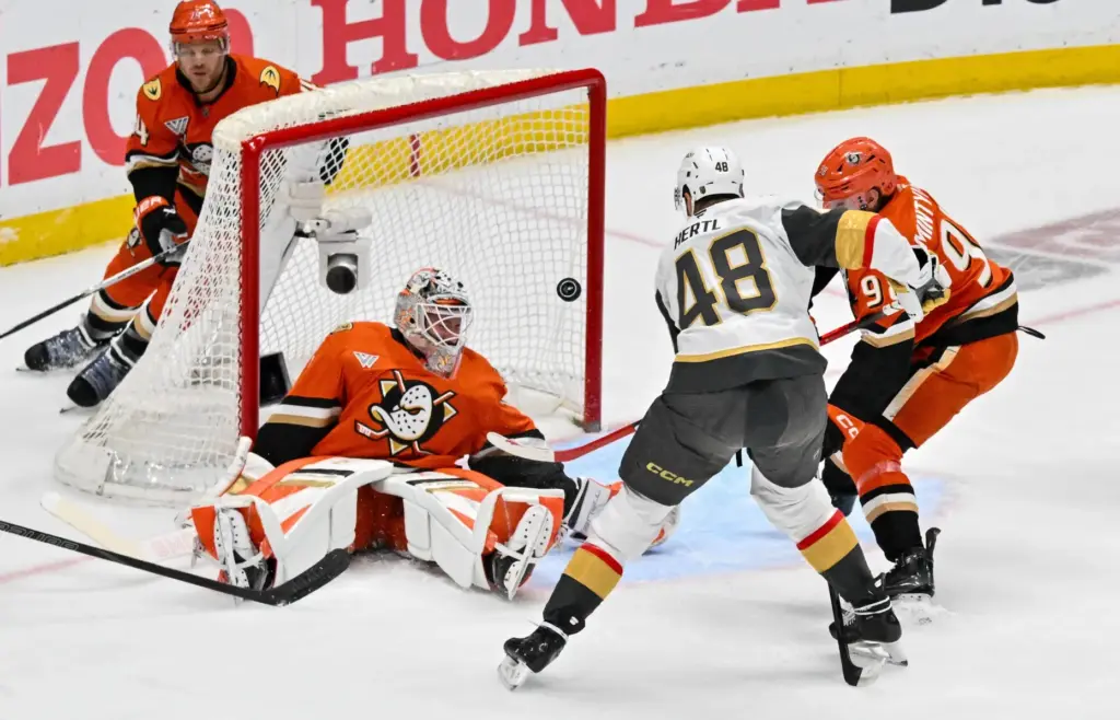 Ducks goaltender Lukas Dostal (1) sits on the ice as...