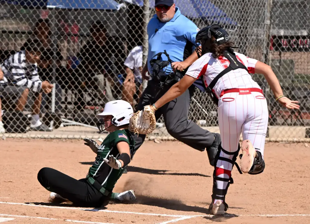 Catcher Danni Lopez #50 of the Whittier Christian Heralds tags...