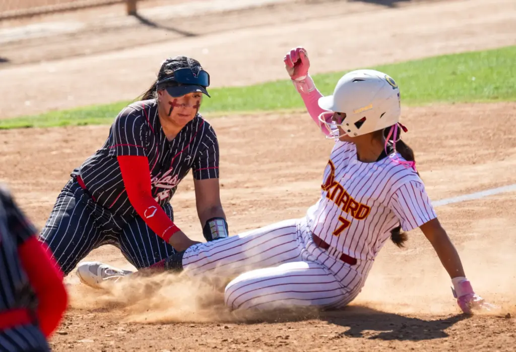 Mission Viejo shortstop Mars Ruvalcaba tags out Oxnard center fielder...