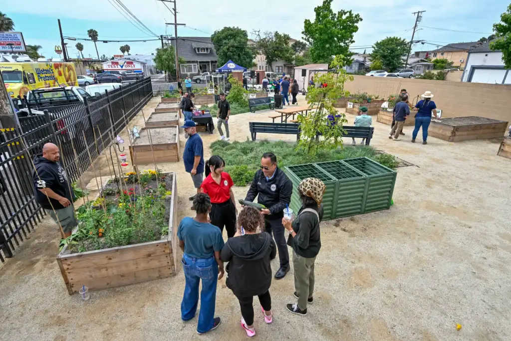 Members of the community and city officials check out the...