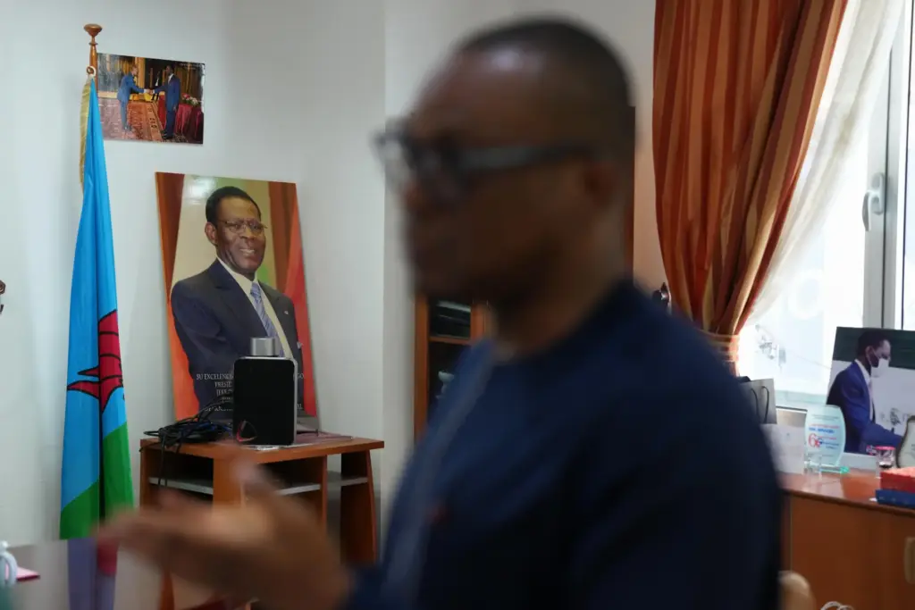 Framed portraits of Equatorial Guinea President Teodoro Obiang Nguema Mbasogo.