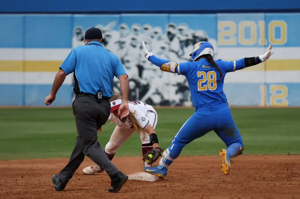 UCLAâs Alexis Ramirez reaches second base safely during the NCAA...