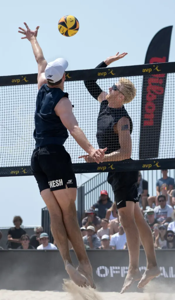 Chase Budinger gets one past Andy Benesh, left, during the...