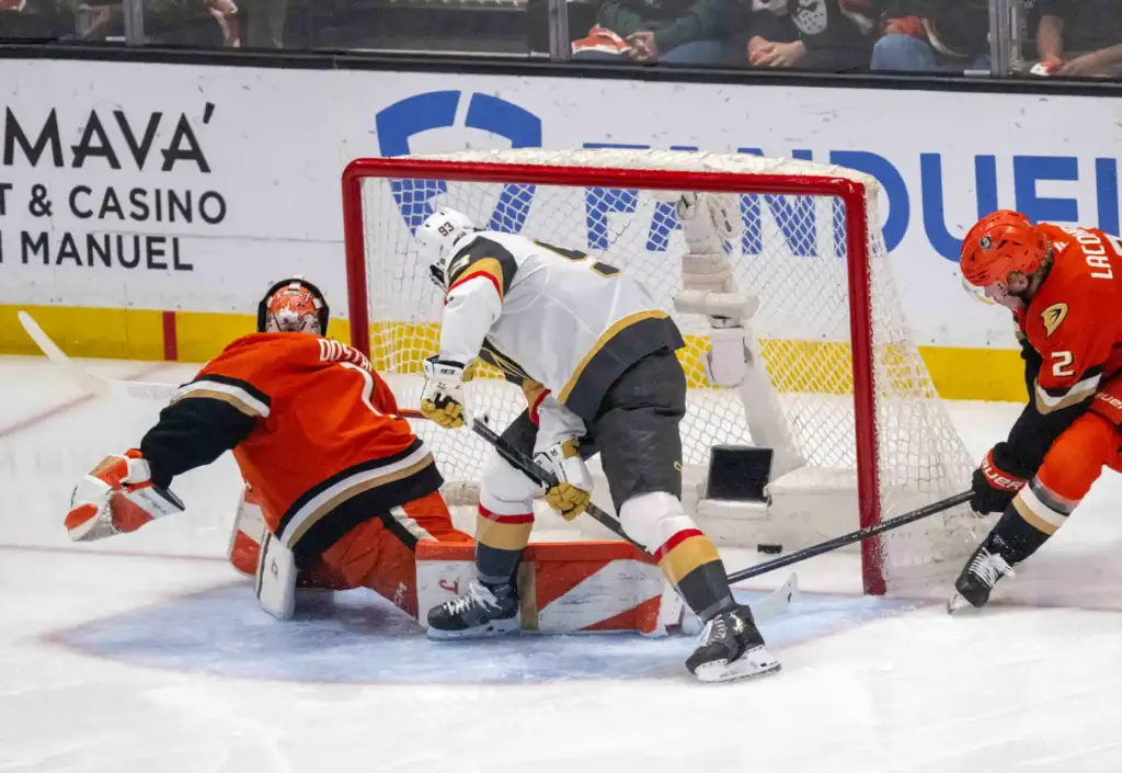 The Vegas Golden Knightsâ Mitch Marner (93) shoots between his...