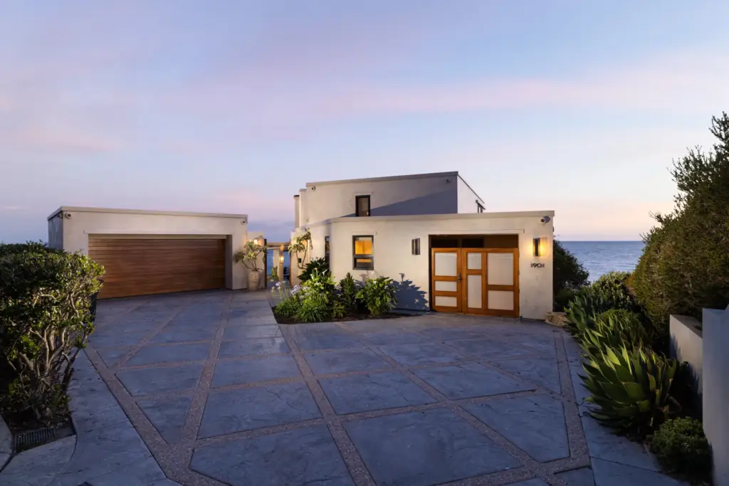 The home sits at the end of a gated driveway....