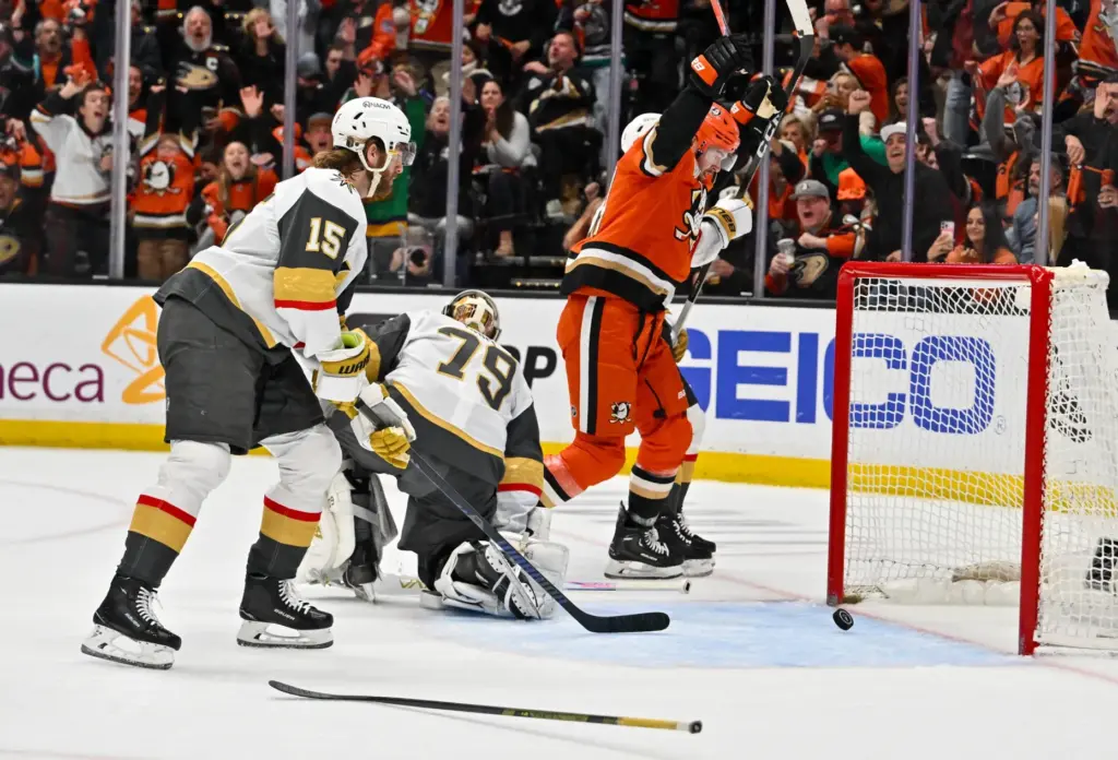 The Ducksâ Ross Johnston (44) reacts after scoring against the...