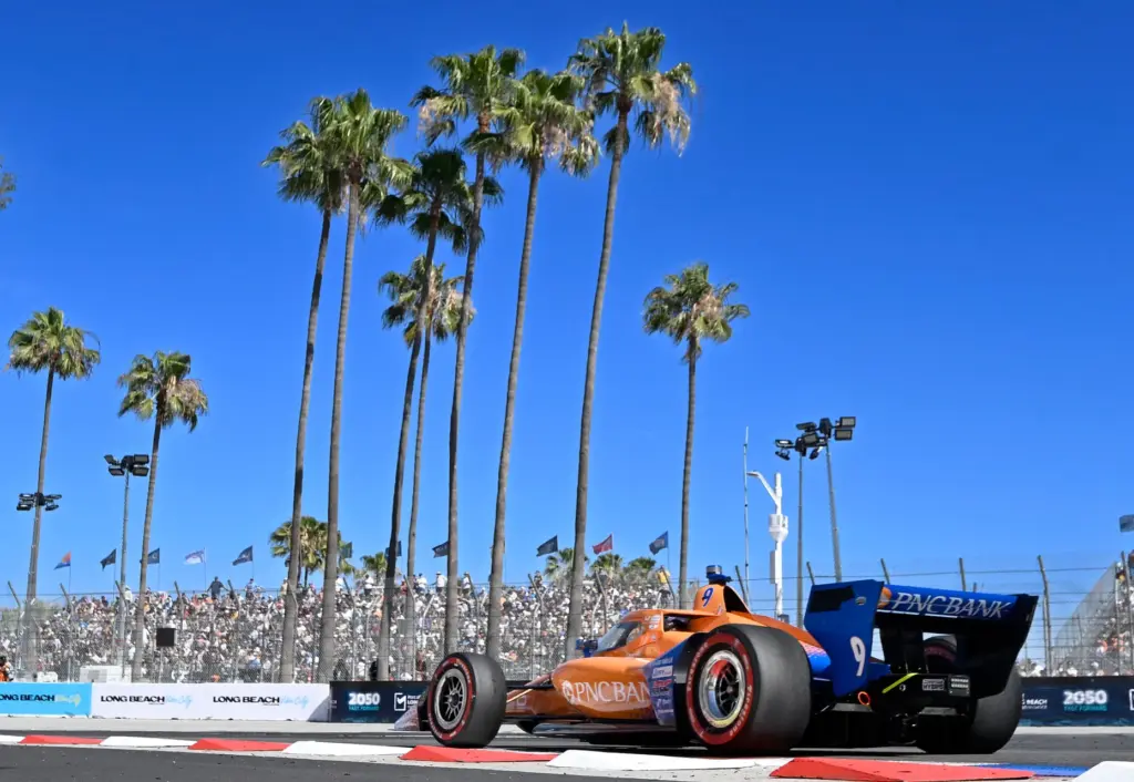 Indycar driver Scott Dixon races towards the hairpin during the...