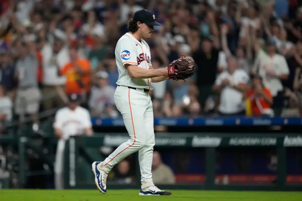 Houston Astros relief pitcher Bryan King celebrates after the final...
