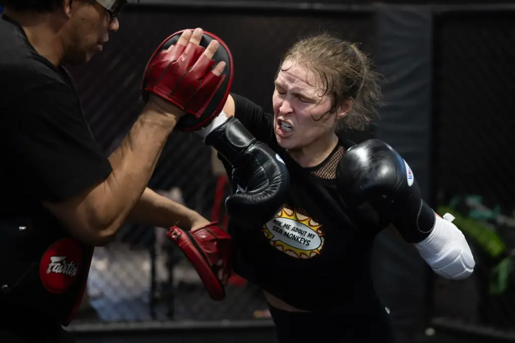 Former UFC champion and Olympic medalist Ronda Rousey prepares for...