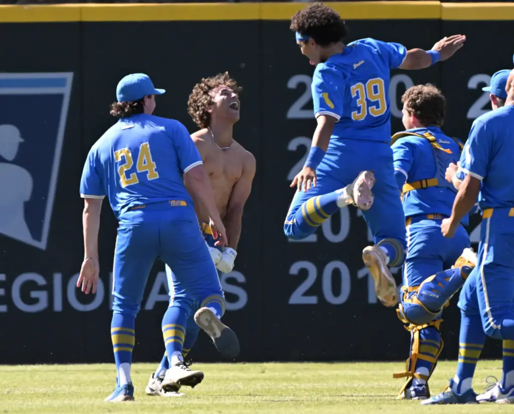 Phoenix Call #4 of the UCLA Bruins is mobbed by...