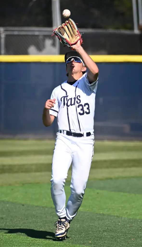 Cameron Hatfield (33) of Newport Harbor catches the ball to...