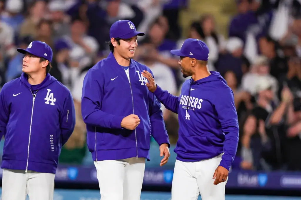 Dodgers stars Shohei Ohtani, left, and Mookie Betts celebrate on...