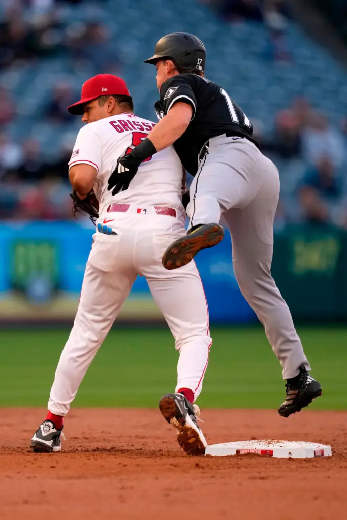 Angels second baseman Vaughn Grissom, left, and the Chicago White...