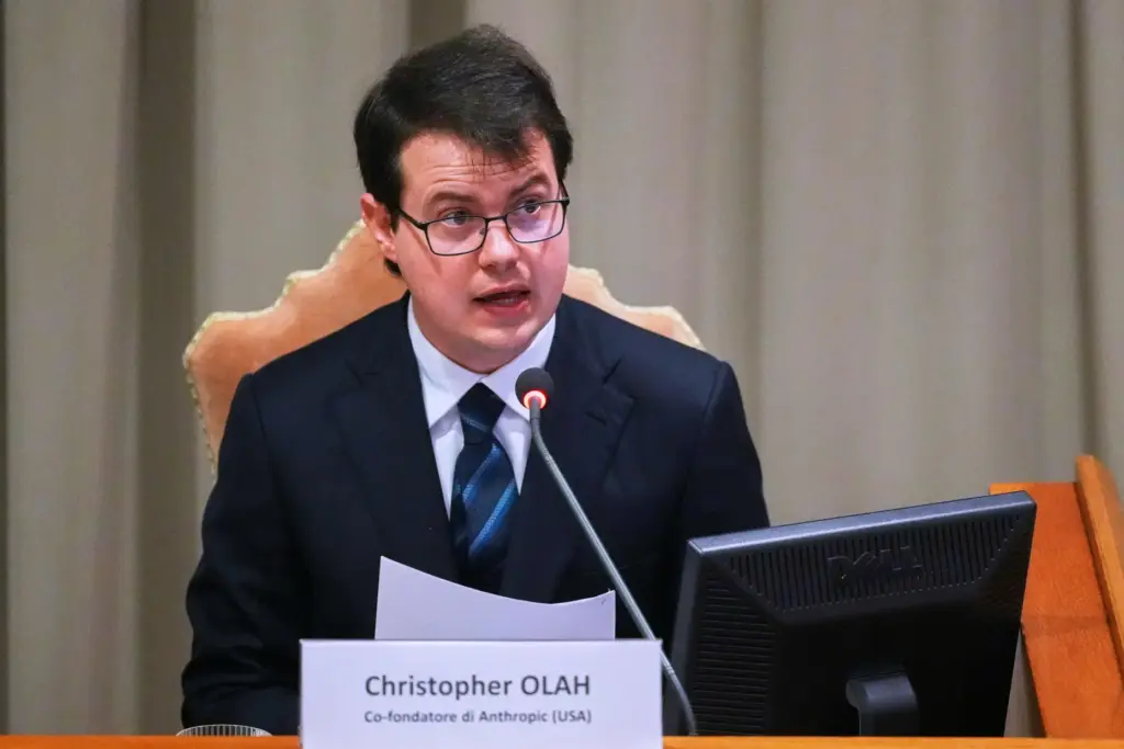 Anthropic co-founder Christopher Olah speaks during the presentation of Pope Leo XIV's first encyclical.