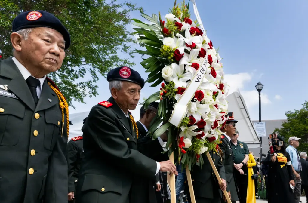 Alumni of the Vietnamese National Military Academy present a wreath...