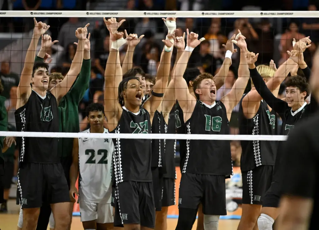 Hawaii players celebrate their win against Long Beach State in...