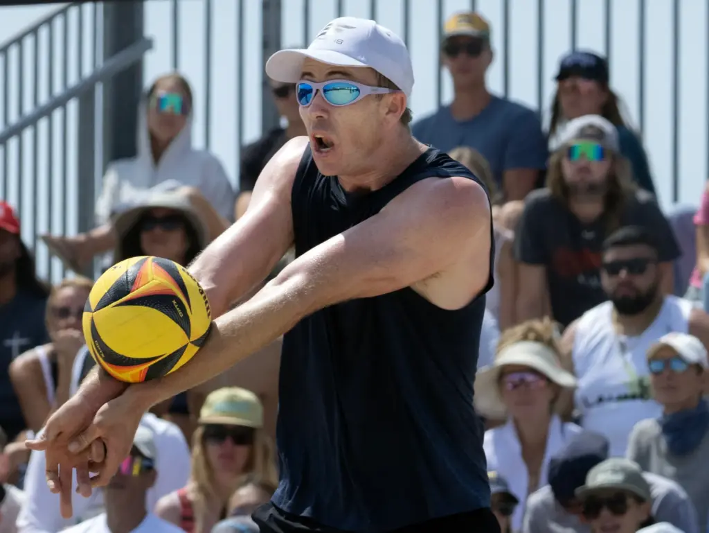 Andy Benesh connets with the ball during the AVP menâs...