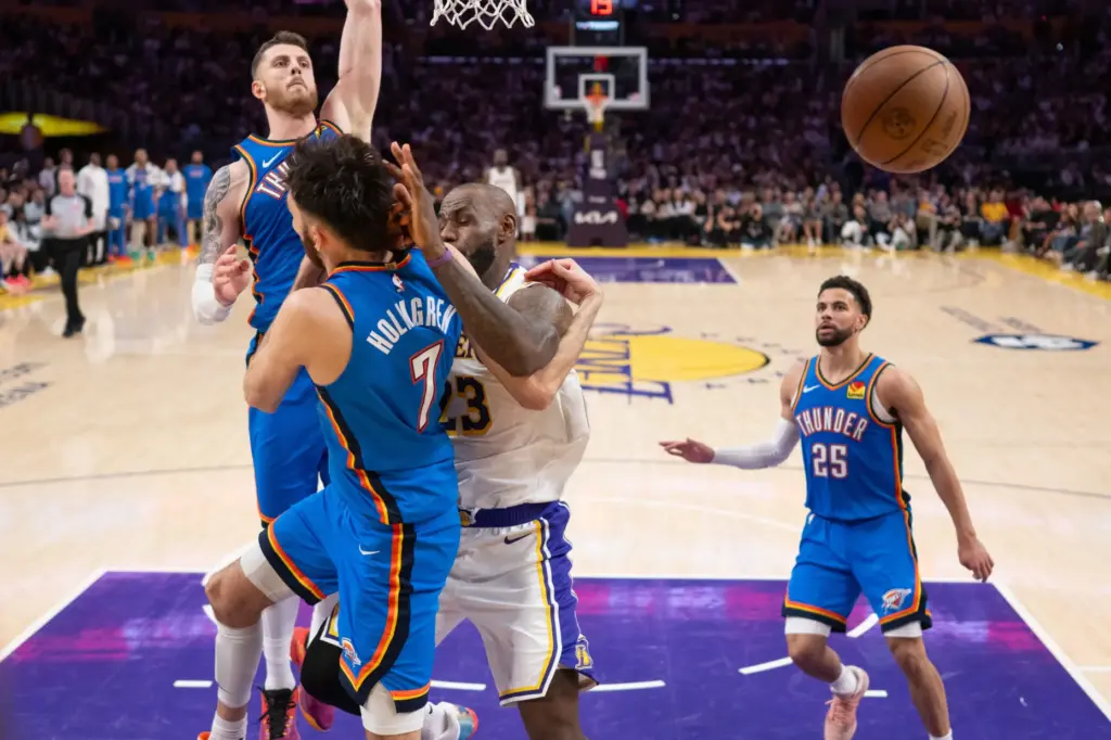 Lakers star LeBron James (23) is fouled by Oklahoma City...