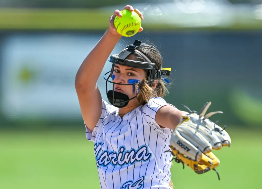 Marinaâs Mia Valbuena, who pitched the whole game, throws to...