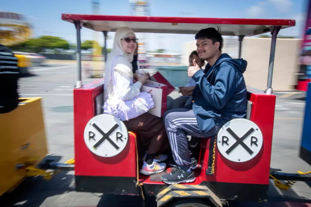 Visitors take in a train ride during the celebration of...