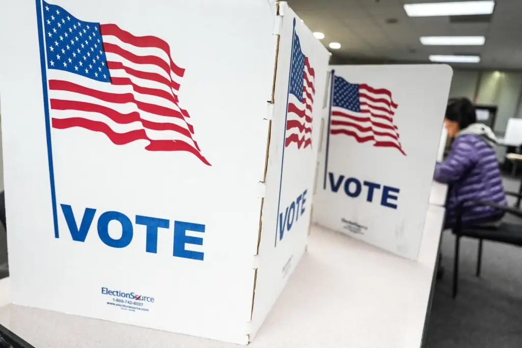 A person votes in the Virginia redistricting referendum at Fairfax...