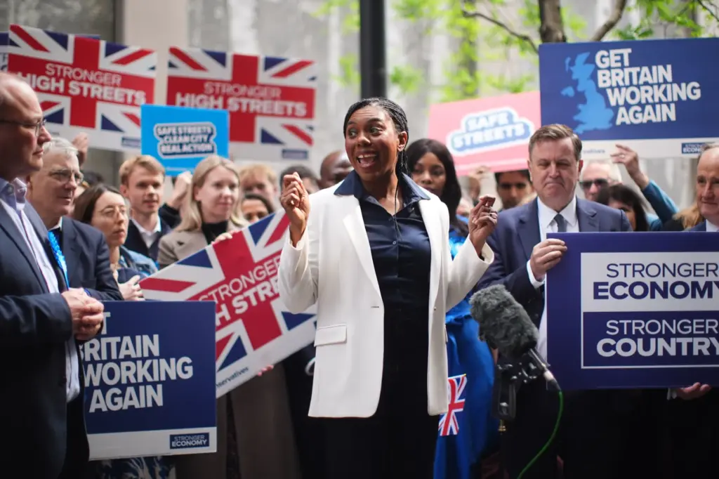 Britain's Conservative Party leader Kemi Badenoch meets supporters in Westminster.