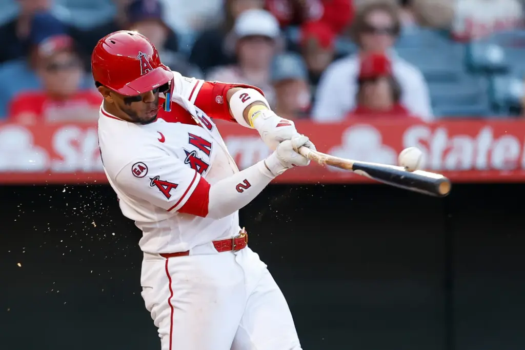 The Angels’ Oswald Peraza hits a ground ball and reaches...