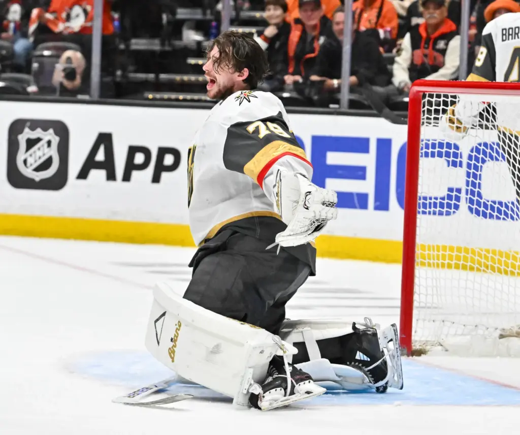 Vegas Golden Knights goaltender Carter Hart reacts after losing a...
