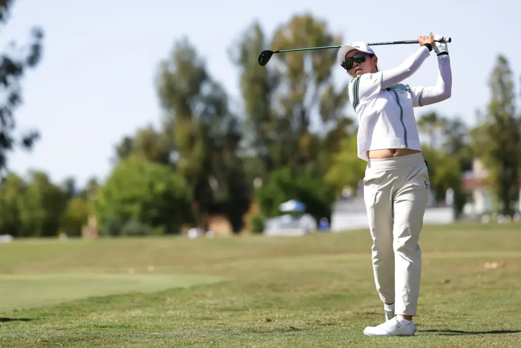 Jin Hee Im hits from the rough on the tenth...