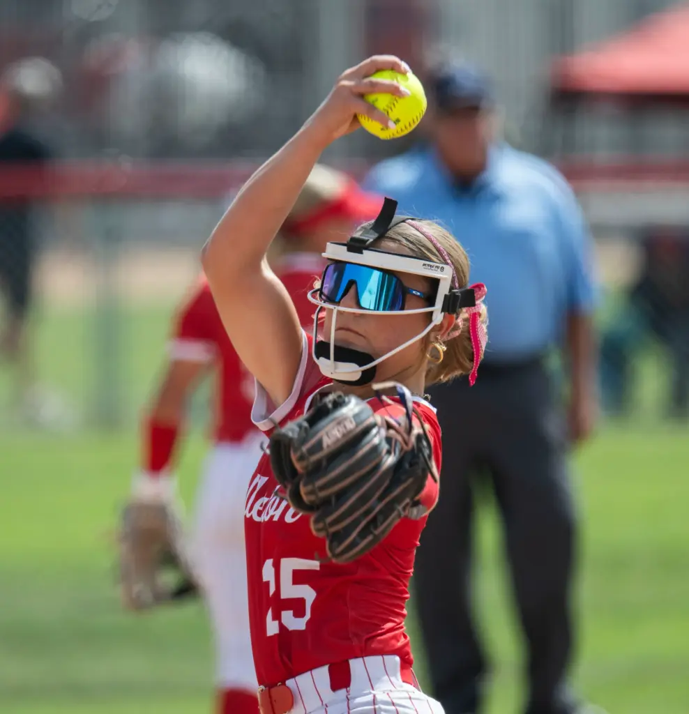 Fullerton pitcher Katelynn Mathews winds to deliver a pitch against...