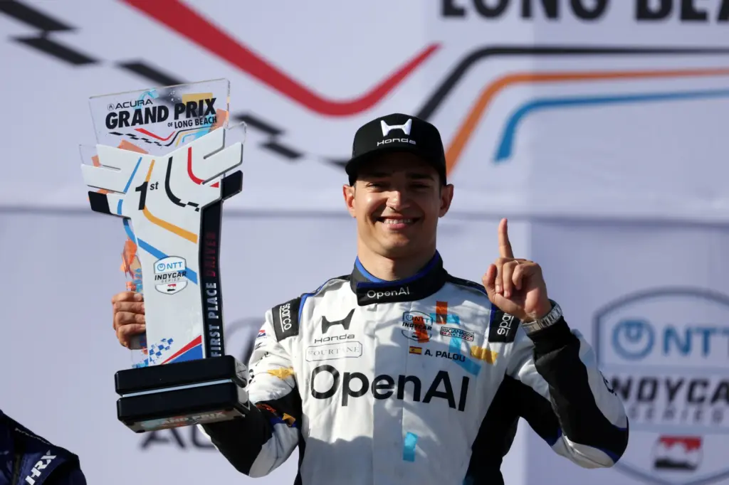 Indycar driver Alex Palou celebrates after winning the 51st Grand...