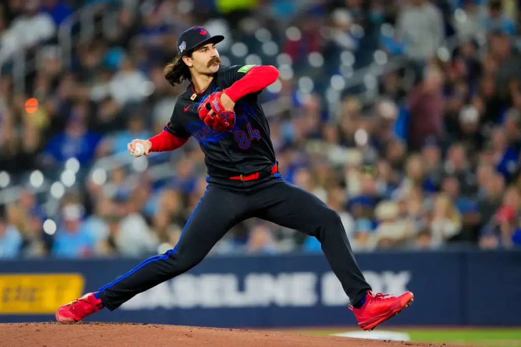 Toronto Blue Jays starting pitcher Dylan Cease throws to the...