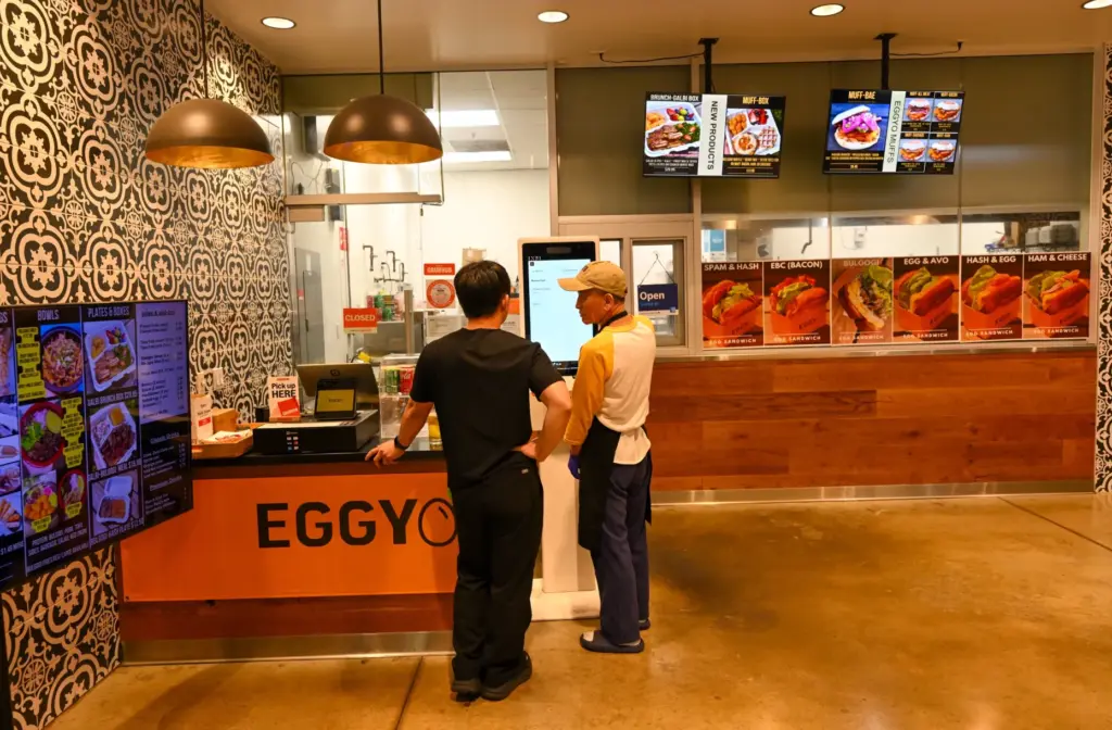 John Lee helps a customer at Eggyo at Rodeo 39...
