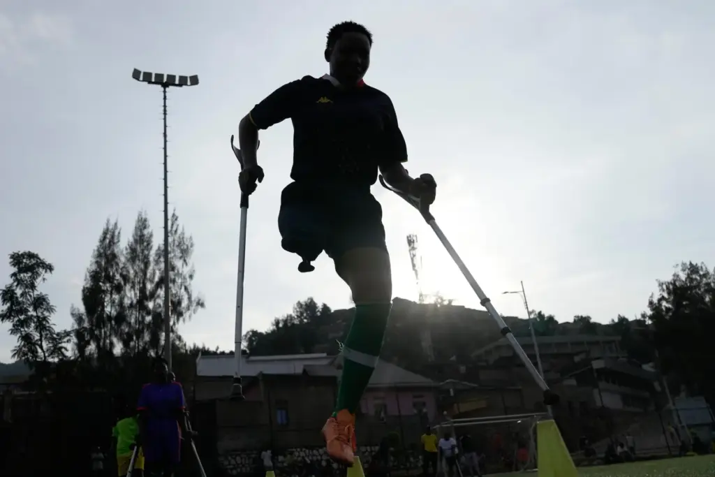 A soccer player on the Rwanda Amputee team takes part...