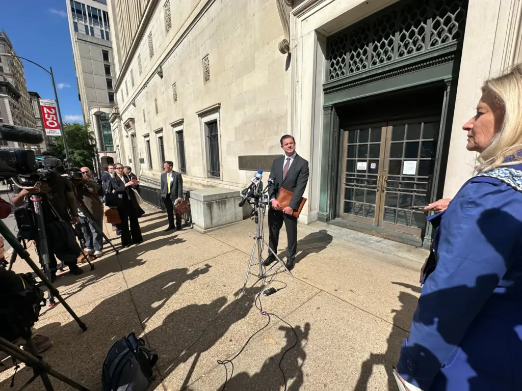 Attorney Matthew Seligman, representing Democratic state legislators, speaks with the media.